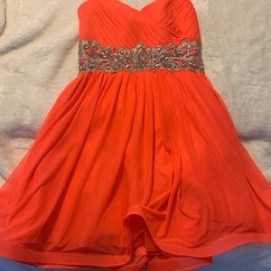 Neon pink strapless prom dress